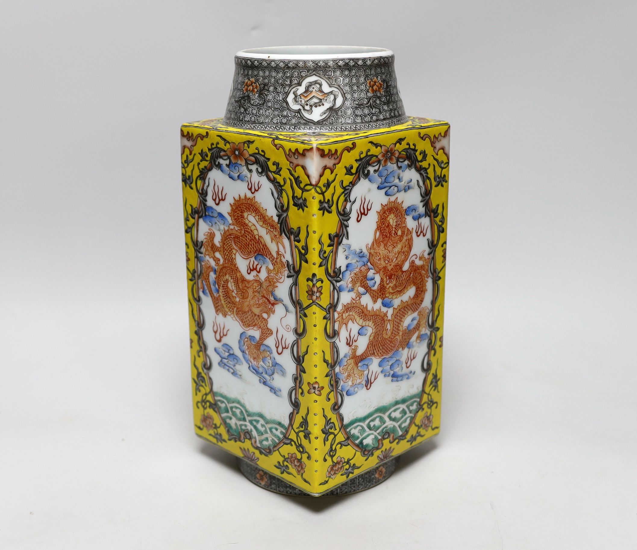 A Chinese enamelled porcelain cong-shaped vase, decorated with dragons chasing the flaming pearl, 29cm high